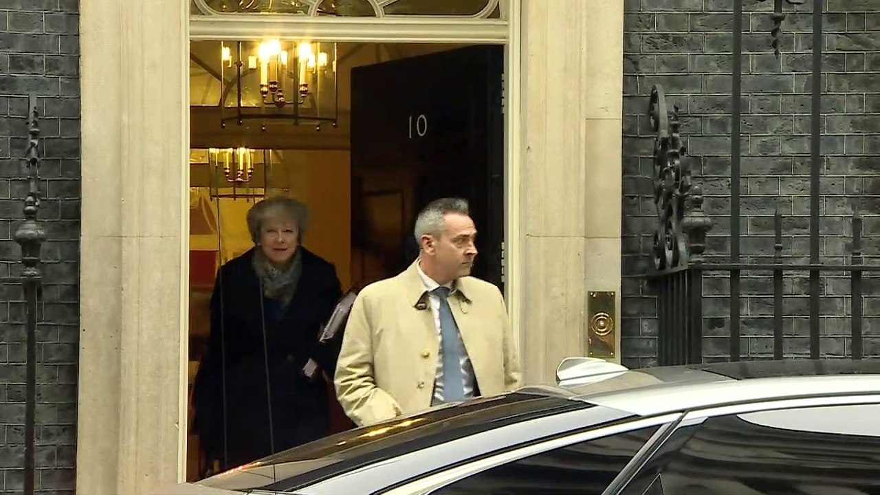 Theresa May departs Downing Street