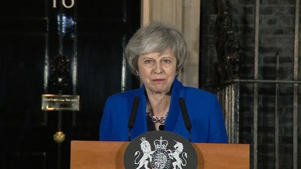 British PM Theresa May takes conciliatory approach after winning confidence vote