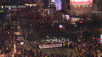 Belgrade protesters march in honour of murdered politician