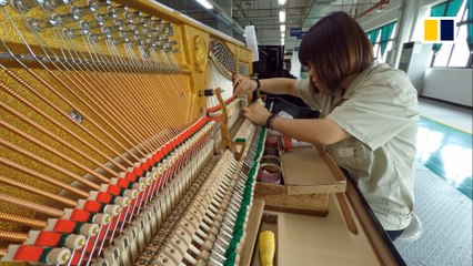 Inside the world's biggest piano factory