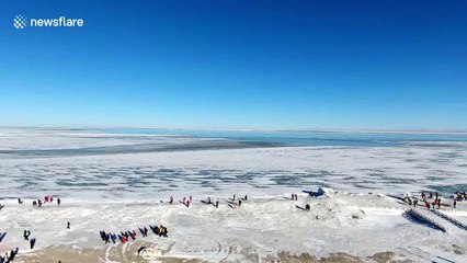 Spectacular drone shows China’s largest saltwater lake freezing