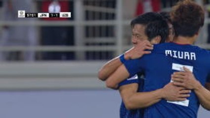 Japan beat Uzbekistan to top spot in Group F