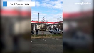 Crazy: Car drifts around gas station