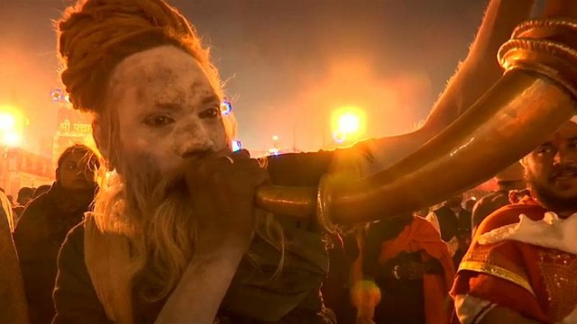 Ash-smeared holy men attend India's Kumbh Mela