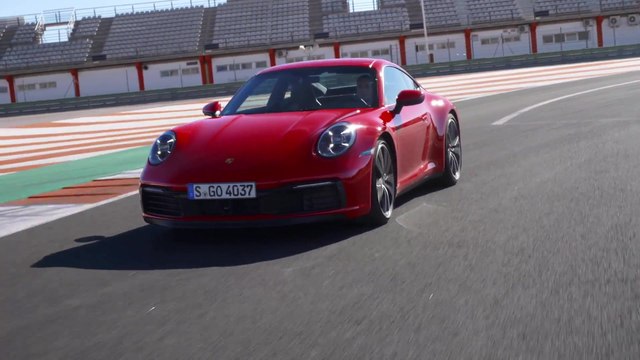 The new Porsche 911 Carrera 4S Guards Red on the Race Track