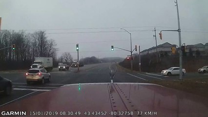 Out of Control Truck Comes Inches from Semi Collision