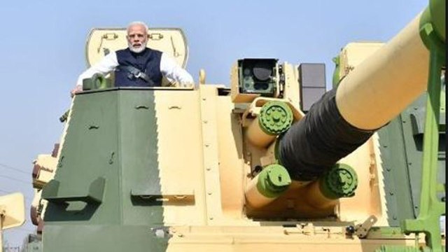 PM Modi rides K9 Vajra Self Propelled Howitzer, Video Viral | Oneindia News