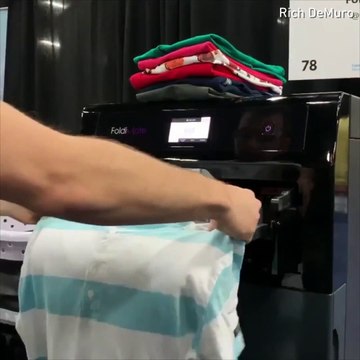 Аппарат по складыванию одежды