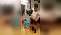 Kentucky teen with autism and cerebral palsy dribbles basketball for first time, cheered on by baby brother