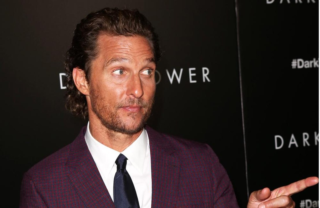 Matthew McConaughey wrestles with son