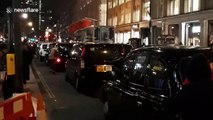 London black cab drivers block streets protesting at Tottenham Court Road