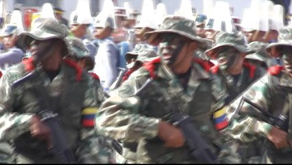 Venezuela says rogue officers arrested, bases under control