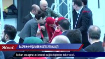 Bakan Turhan'ın konuşması sırasında bir hostes fenalaştı