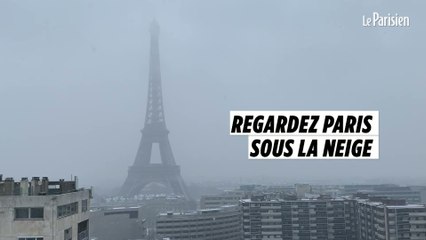 Скачать видео: Neige à Paris : les touristes découvrent la capitale sous les flocons