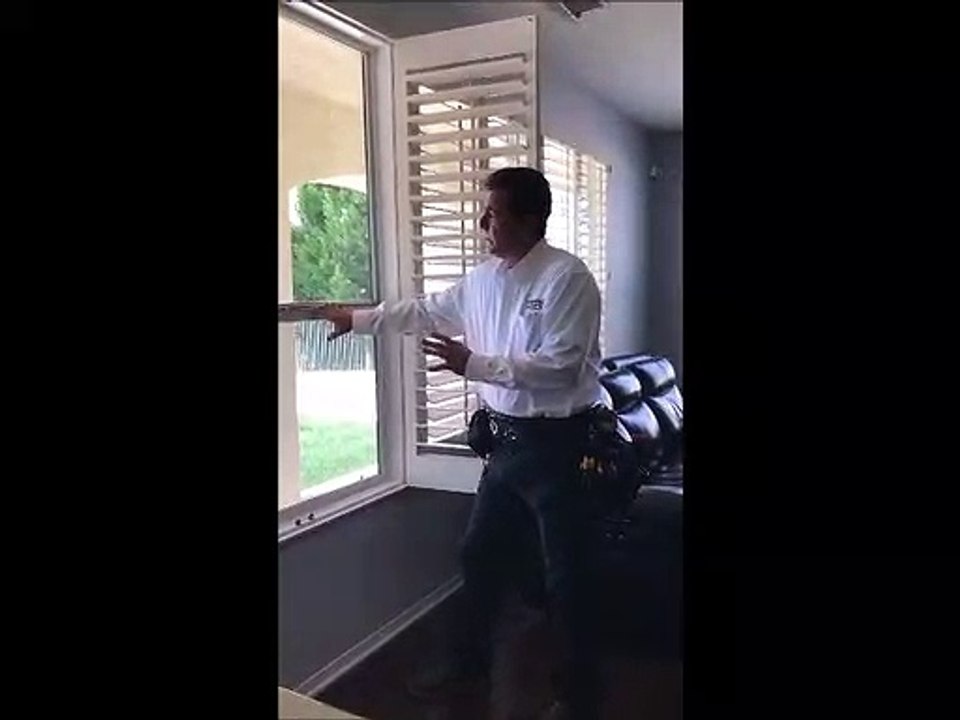 Home Inspector Shows Window Inspection