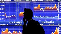 Asian shares dip, worries over growth and trade sour mood