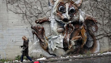 This street art is raising attention to endangered animals and it is made of plastic waste