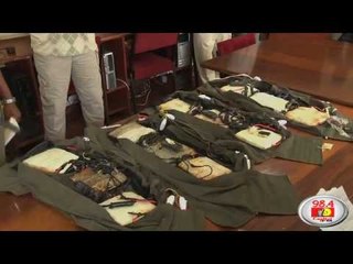 8 sought over terror plot after weapons seizure