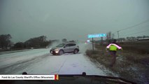Watch: Cop Escapes Injury After SUV Slides And Heads Toward Him On Icy Road