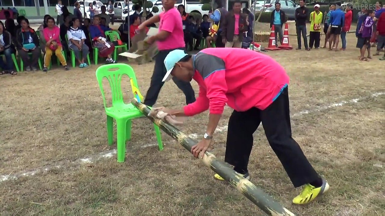 Bizarre Bamboo Pole Climbing Competition