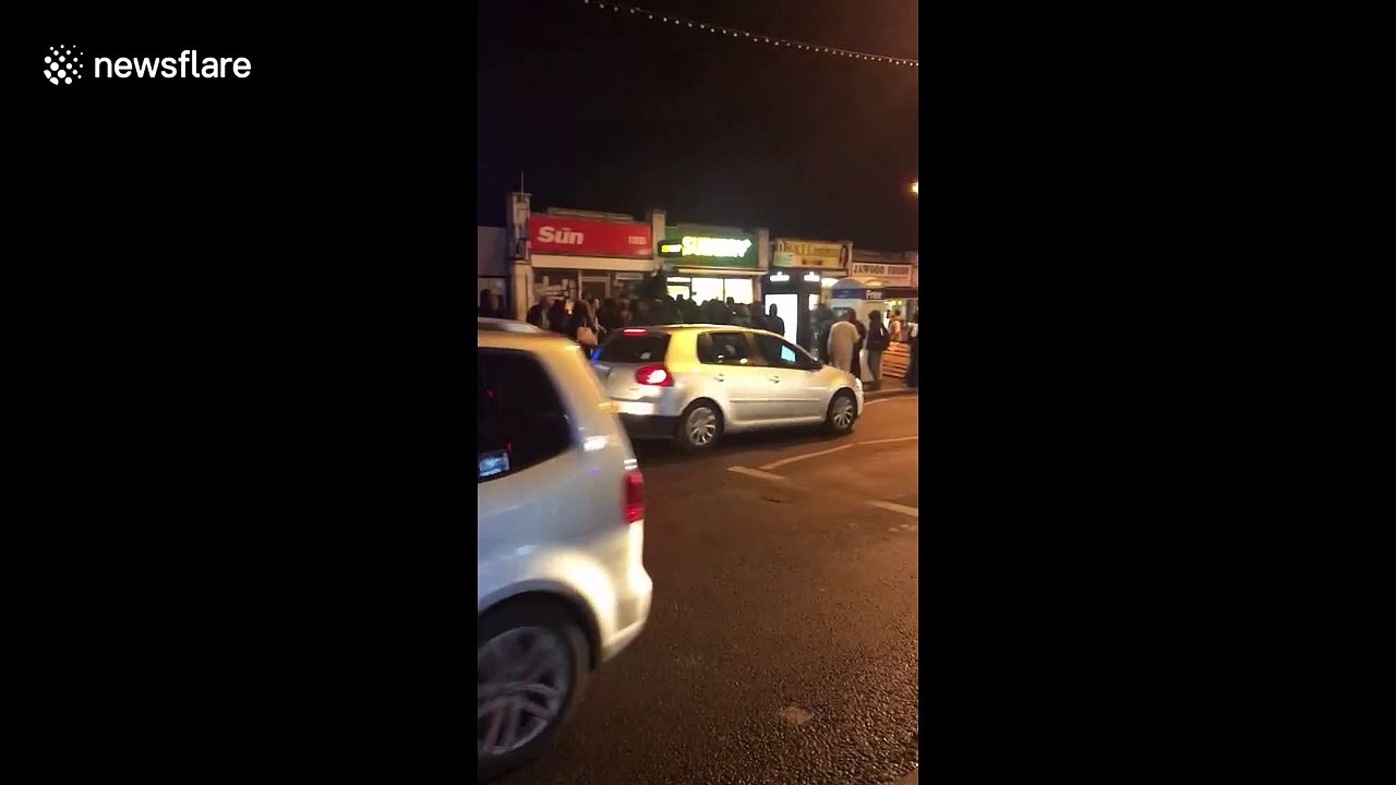 Scores of youths smash up Subway shop in East London