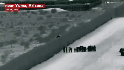 Surveillance Video: Central American Migrants Scale Border Wall With A Ladder Before CBP Catches Them
