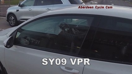 SY09VPR - Playing with his mobile phone - Auchmill Road, Aberdeen