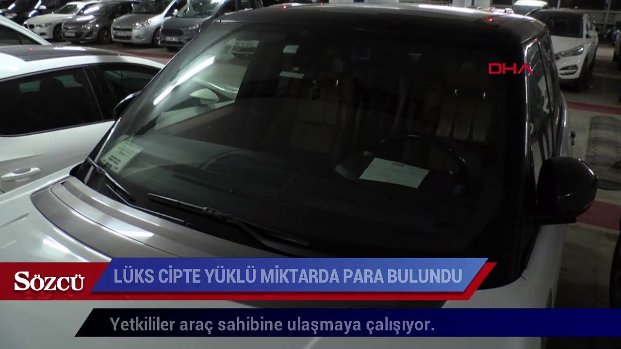 Havalimanı otoparkında açık bırakılan lüks cipte yüklü miktarda para bulundu