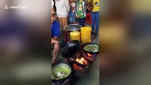 Master chef in Vietnam uses 12 pans to cook 5000 crepes a day at 'Crepe Temple'