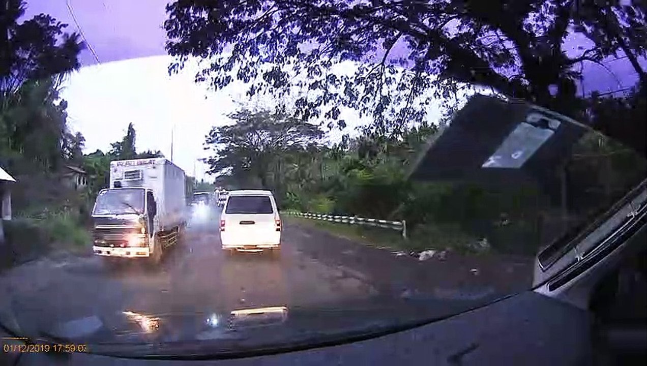 Bus Takes out Tricycle