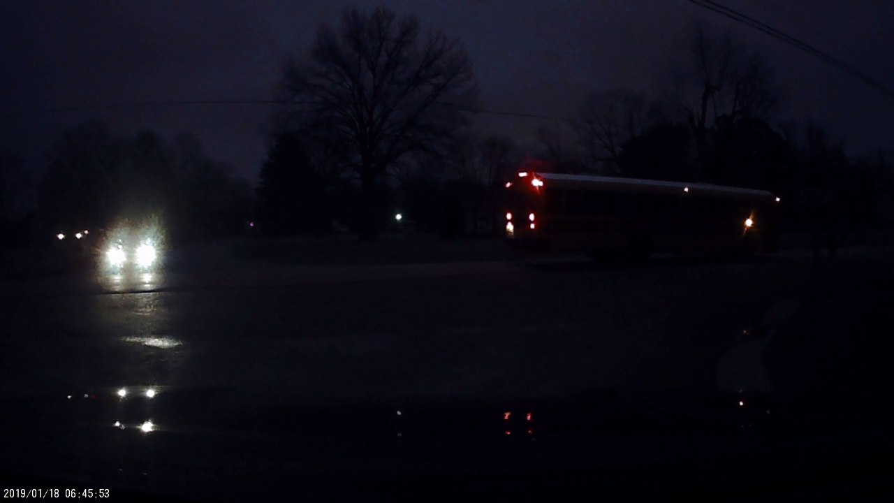 Inattentive Driver Drives Straight into School Bus