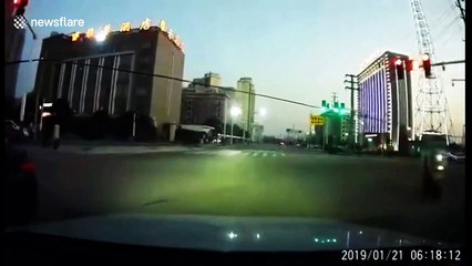 Power lines spark dangerously after being brought down by building demolition