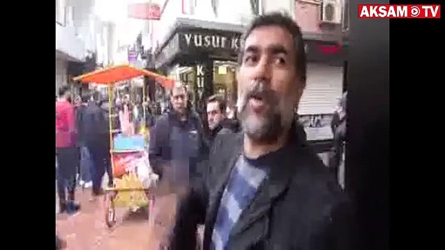 Kuyumcu, tabancalı ve kar maskeli soyguncuyu sopayla kovaladı