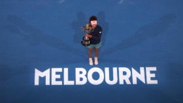 Osaka battles past Kvitova, wins second straight slam