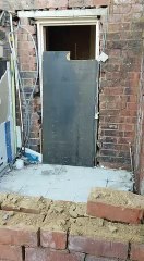 Worker Comically Demonstrates Demolition on Site