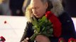 Vladimir Putin lays flowers at the Leningrad memorial