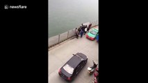 Good Samaritan rescues driver stuck in car sinking into a river