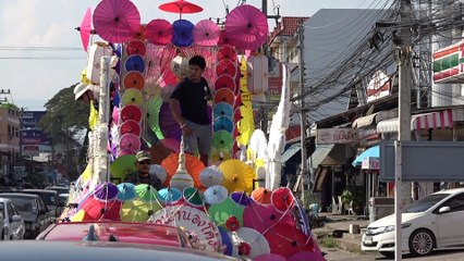 Car Decorated With Dozens Of Umbrellas