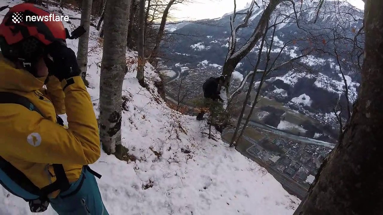 Basejumper does dizzying triple somersault into Alpine valley