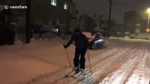 Canadian man goes skiing through Toronto streets during snowstorm