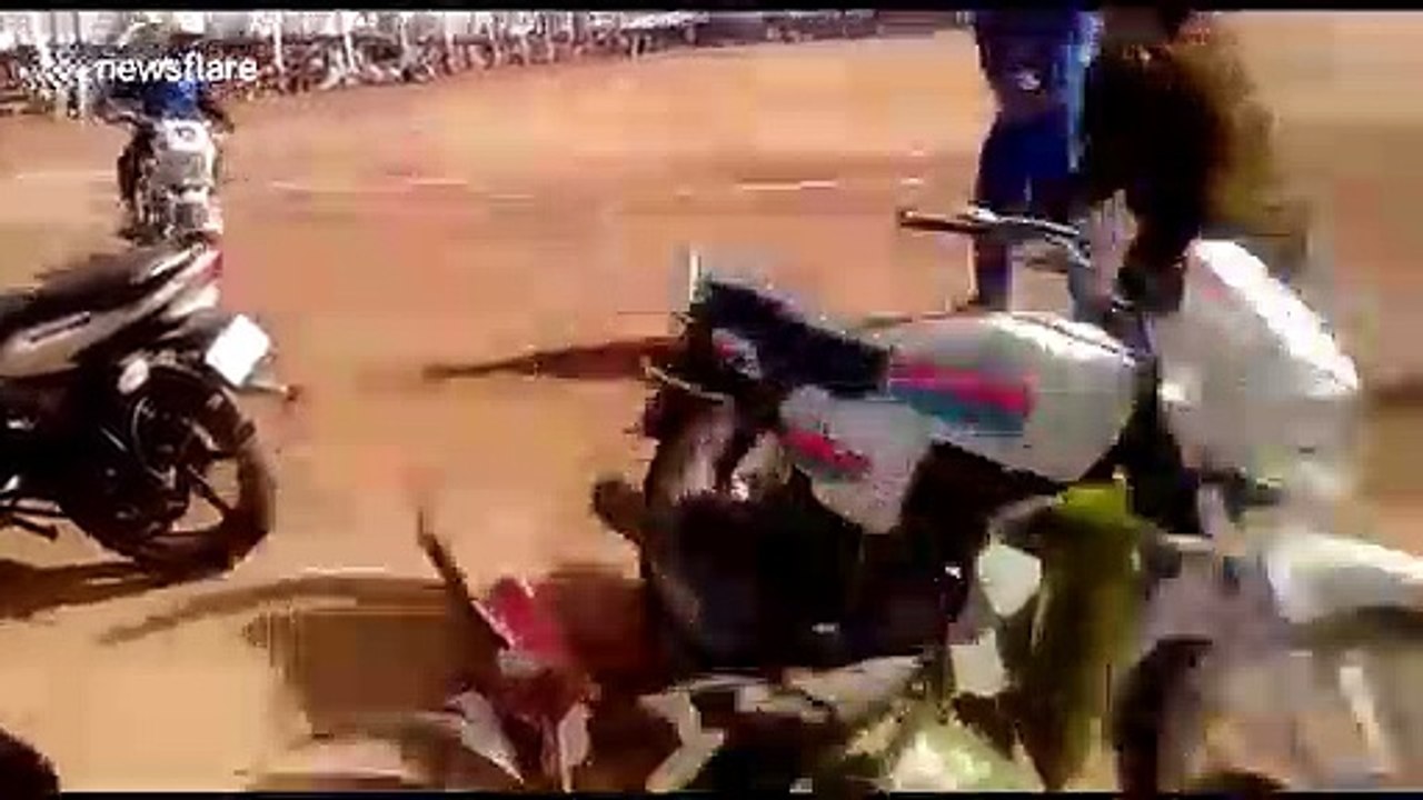 Chaos when riderless bike plunges into crowd of spectators after stunt fail