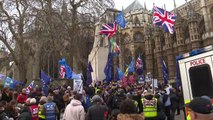 Brexit protesters react as May proposes reopening negotiations