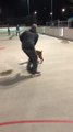 Man Plays Hockey on Ice with Dog