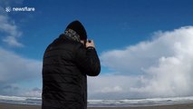 Massive snow cloud rolls into Northern Ireland beach