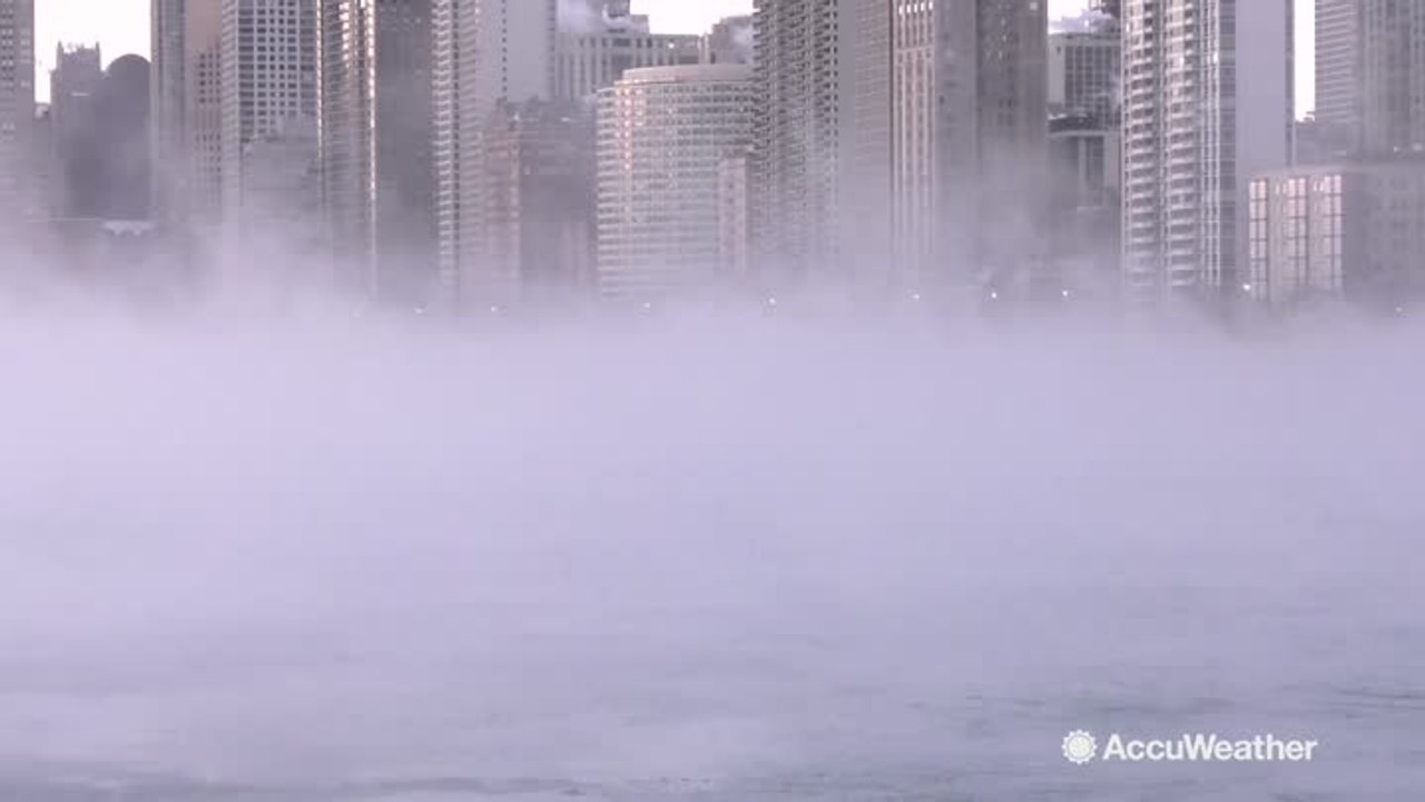 Steam rises off Lake Michigan as temperatures plummet below zero