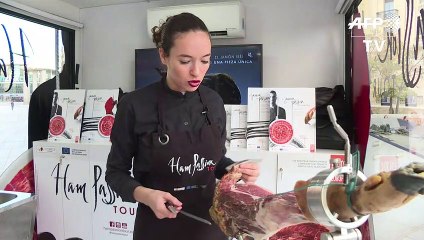 Women enter the select male world of Spanish ham cutters