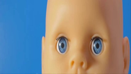 Robotic boy doll talks. Mimicry and imitation of muscle movement.