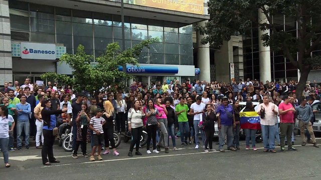 Venezuela's Guaido, protesters urge military to reject Maduro