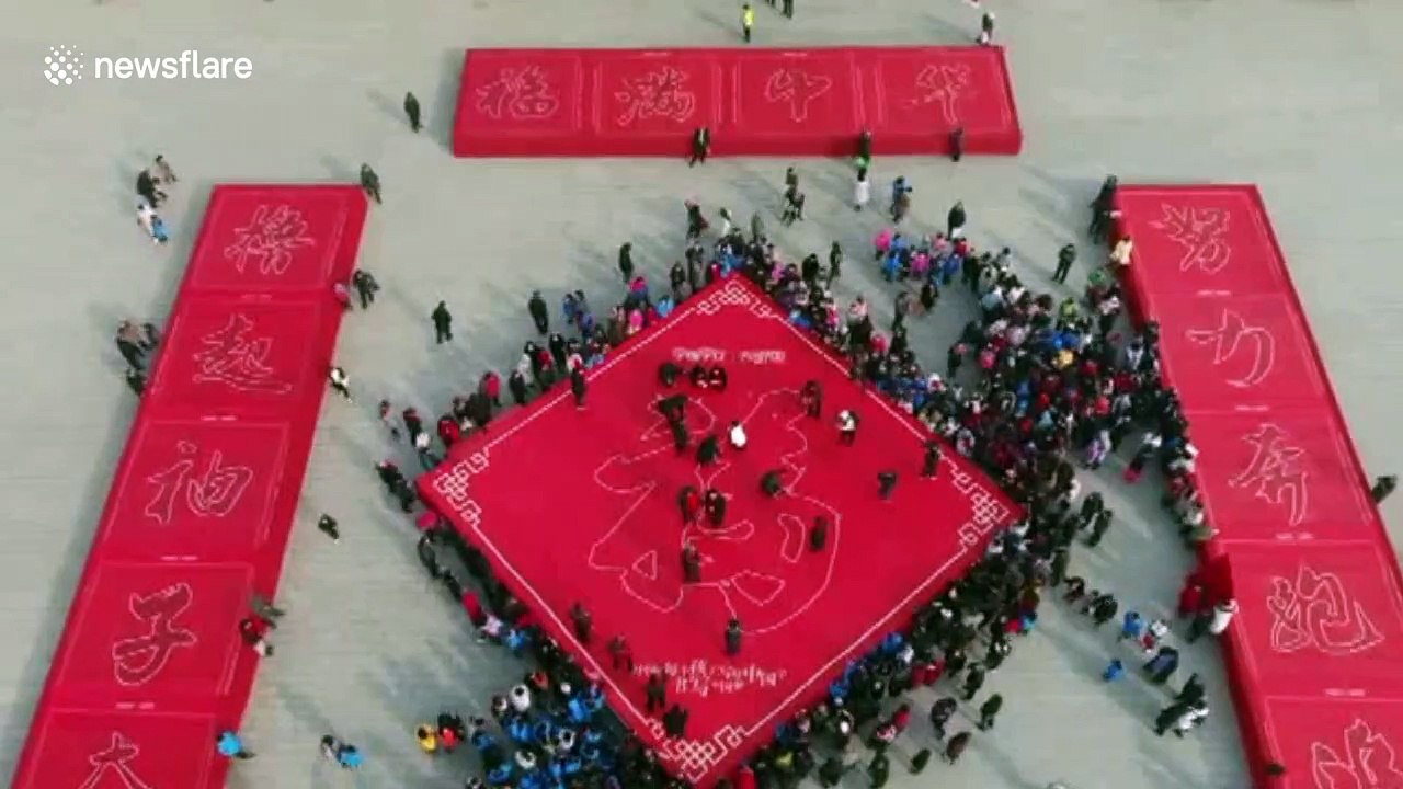 The world’s largest written couplets created in...