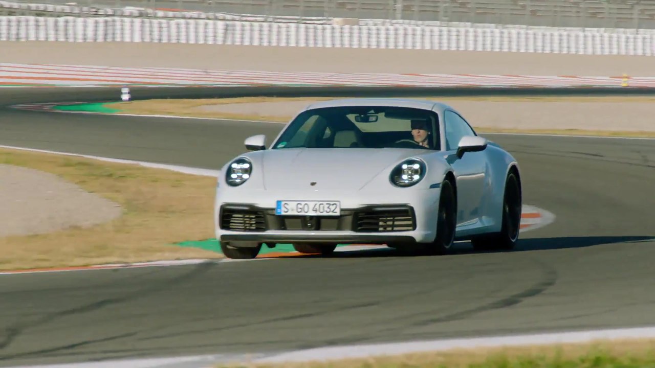 Porsche 911 Carrera S in Carrara White Metallic on the Race Track